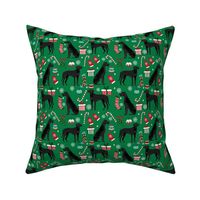 Great Dane black coat christmas presents stockings candy canes winter dog fabric green