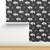 distressed buffalo on dark grey linen