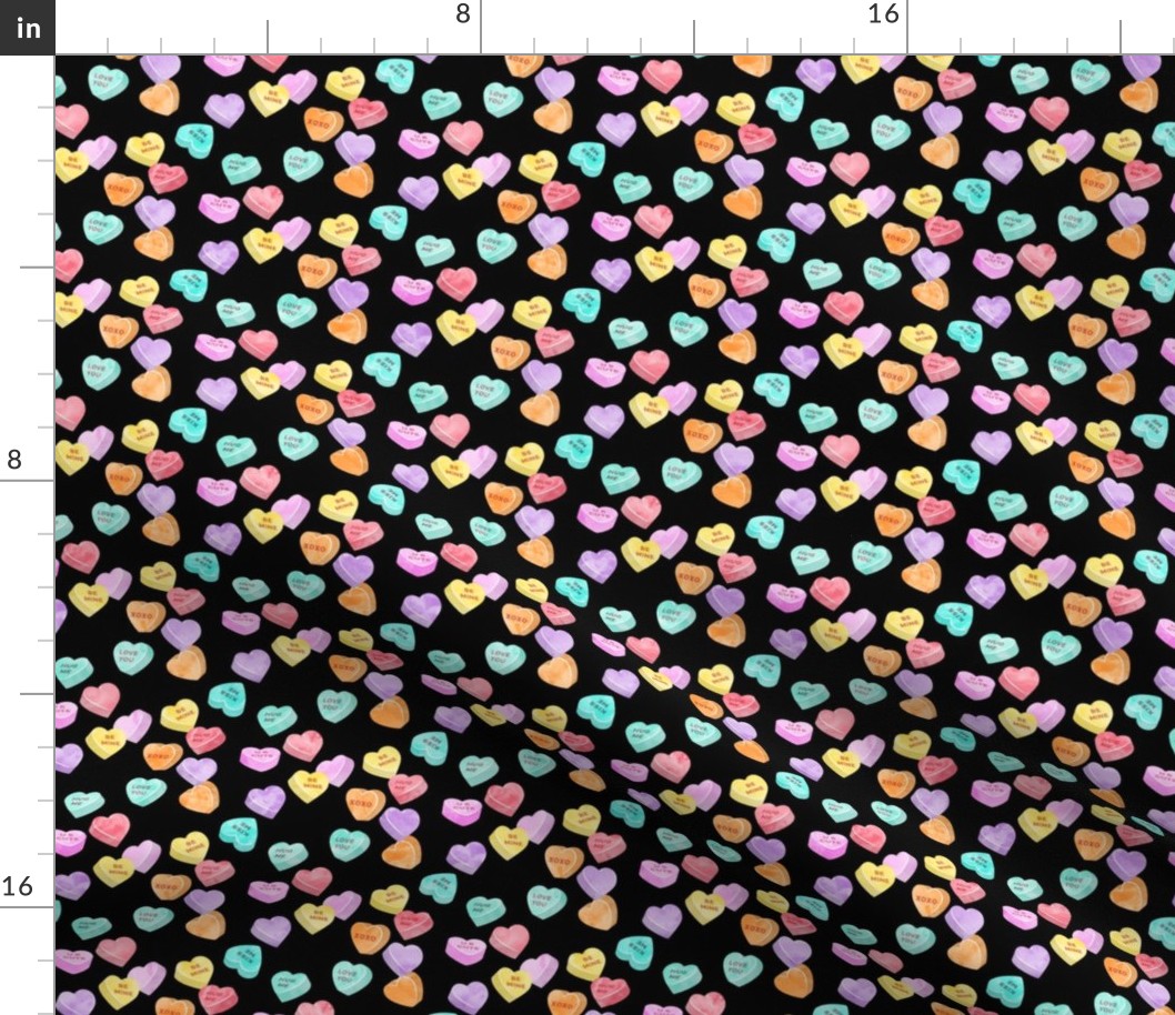 valentines day heart candy - conversation hearts on black