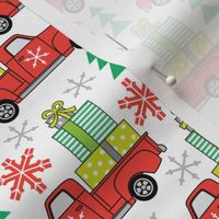 vintage red trucks and christmas packages