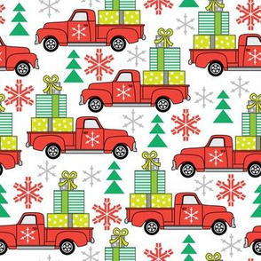 vintage red trucks and christmas packages
