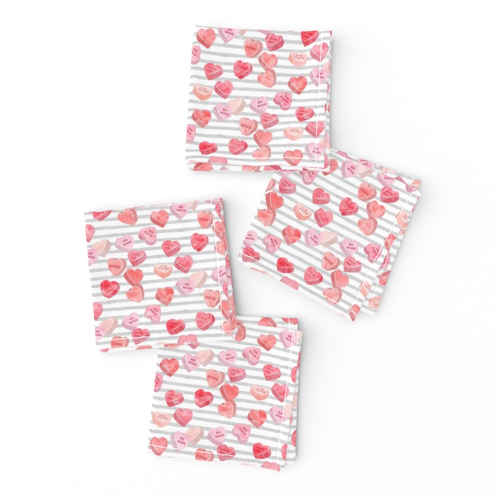 valentines day heart candy - conversation hearts on grey stripes (red)