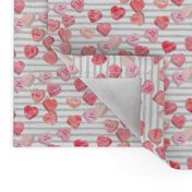 valentines day heart candy - conversation hearts on grey stripes (red)