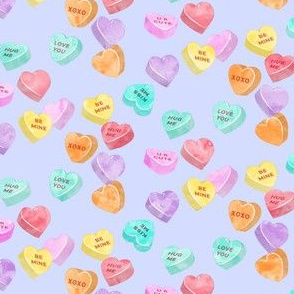 valentines day heart candy - conversation hearts on purple