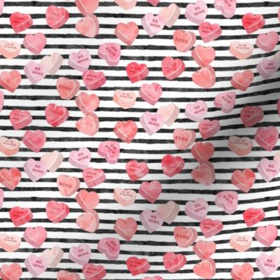 valentines day heart candy - conversation hearts on  stripes (red)