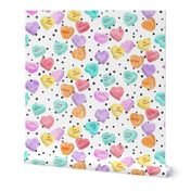 valentines day heart candy - conversation hearts  on spots 