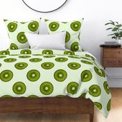 Ripe green kiwi fruit round slice pattern 