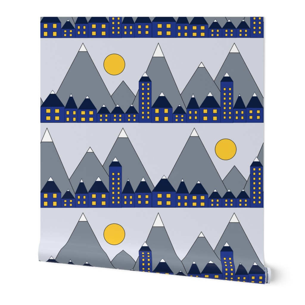 Blue houses in front of snowy mountains and the moon. Geometric shapes winter night. Blue yellow white and gray winter print. Winter village.