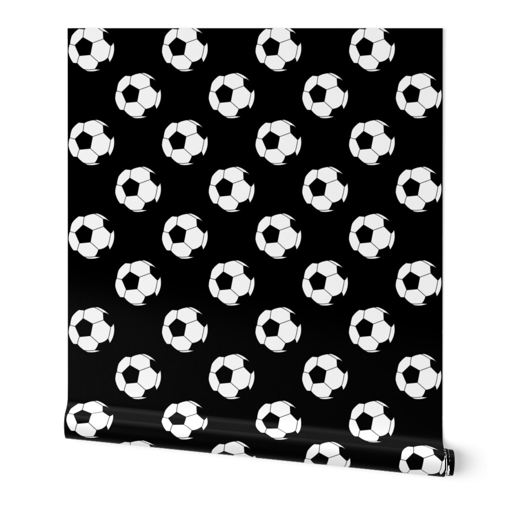 Two Inch Black and White Soccer Balls on Black