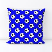 Two Inch Black and White Soccer Balls on Blue