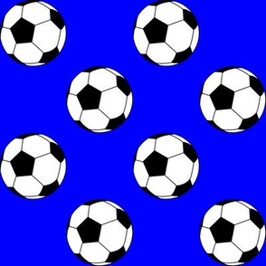 Two Inch Black and White Soccer Balls on Blue