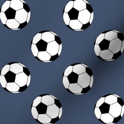 Two Inch Black and White Soccer Balls on Blue Jeans Blue