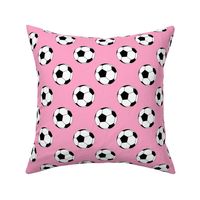 Two Inch Black and White Soccer Balls on Carnation Pink