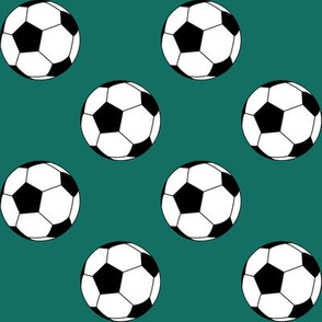 Two Inch Black and White Soccer Balls on Cyan Turquoise Blue