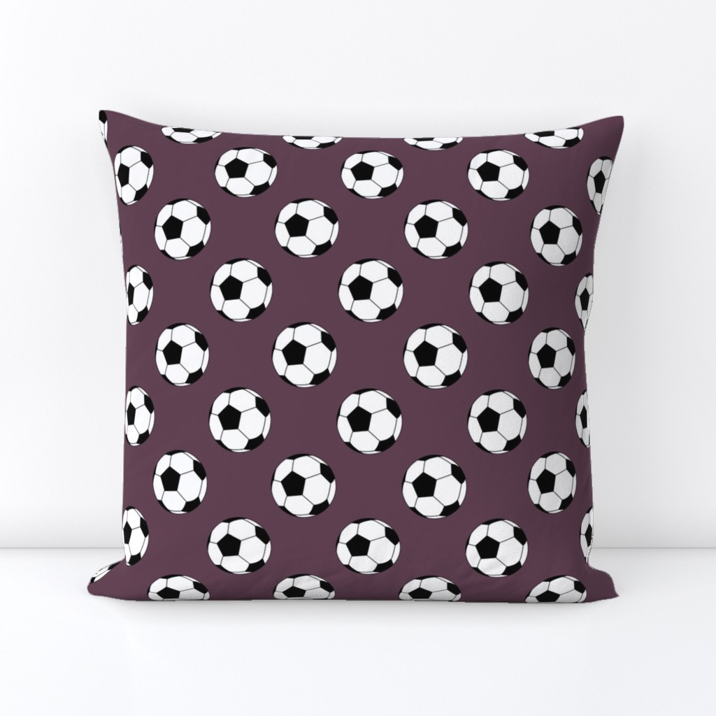 Two Inch Black and White Soccer Balls on Eggplant Purple