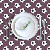 Two Inch Black and White Soccer Balls on Eggplant Purple