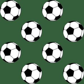 Two Inch Black and White Soccer Balls on Hunter Green