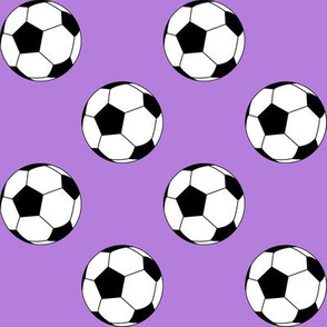 Two Inch Black and White Soccer Balls on Lavender Purple