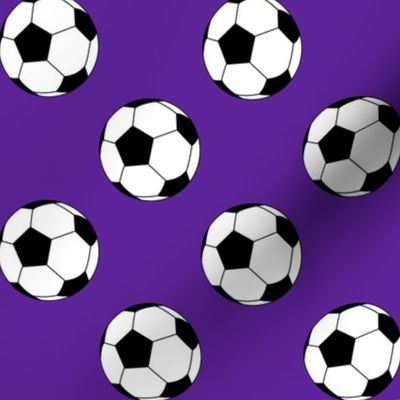 Two Inch Black and White Soccer Balls on Purple