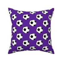 Two Inch Black and White Soccer Balls on Purple