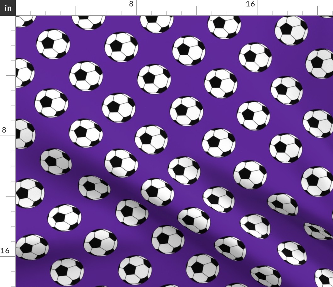 Two Inch Black and White Soccer Balls on Purple