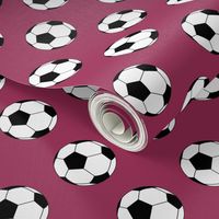 Two Inch Black and White Soccer Balls on Sangria Pink