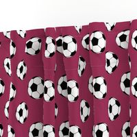 Two Inch Black and White Soccer Balls on Sangria Pink