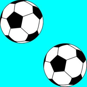 Three Inch Black and White Soccer Balls on Aqua Blue