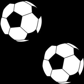 Three Inch Black and White Soccer Balls on Black