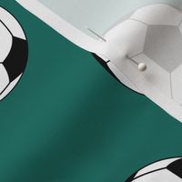 Three Inch Black and White Soccer Balls on Cyan Turquoise Blue