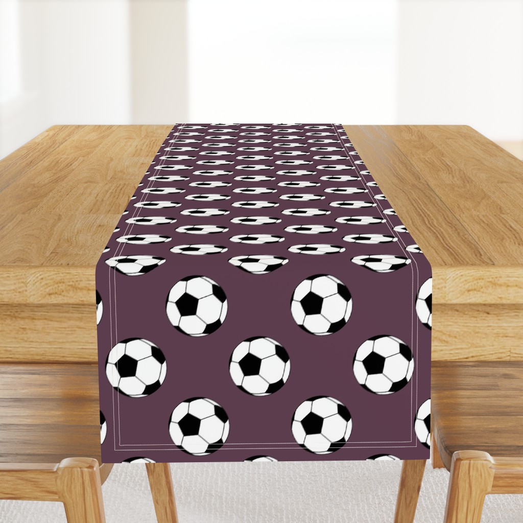 Three Inch Black and White Soccer Balls on Eggplant Purple