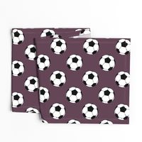 Three Inch Black and White Soccer Balls on Eggplant Purple