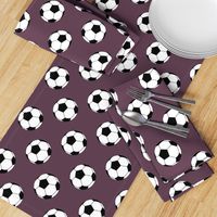 Three Inch Black and White Soccer Balls on Eggplant Purple