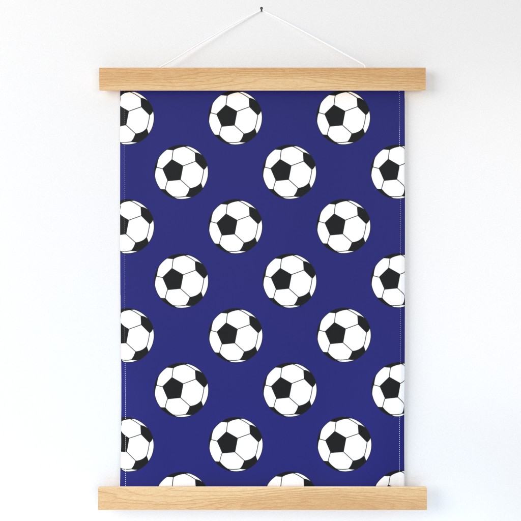 Three Inch Black and White Soccer Balls on Midnight Blue