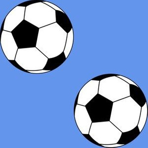 Three Inch Black and White Soccer Balls on Cornflower Blue