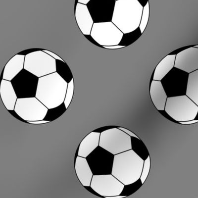 Three Inch Black and White Soccer Balls on Medium Gray