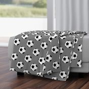 Three Inch Black and White Soccer Balls on Medium Gray