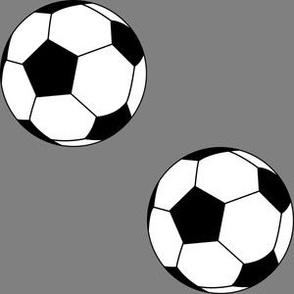Three Inch Black and White Soccer Balls on Medium Gray