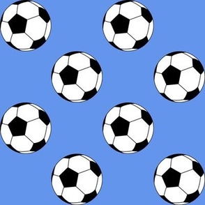 Two Inch Black and White Soccer Balls on Cornflower Blue