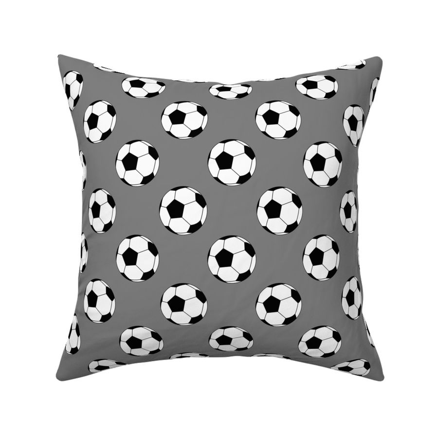 Two Inch Black and White Soccer Balls on Medium Gray