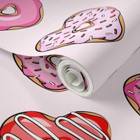 heart shaped donuts - valentines red and pink on light pink