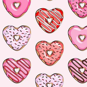 heart shaped donuts - valentines red and pink on light pink