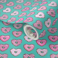 (small scale) heart shaped donuts - valentines pink  on dark teal