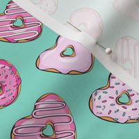 (small scale) heart shaped donuts - valentines pink  on teal