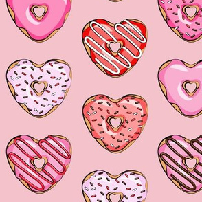 heart shaped donuts - valentines red and pink on pink