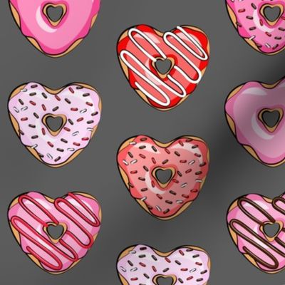 heart shaped donuts - valentines red and pink on grey