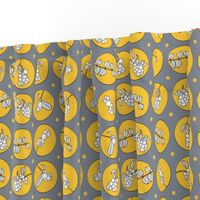 stylised snowberry branches in yellow circles on gray