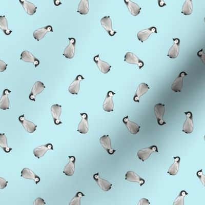 Baby Emperor Penguins on pale blue - half size