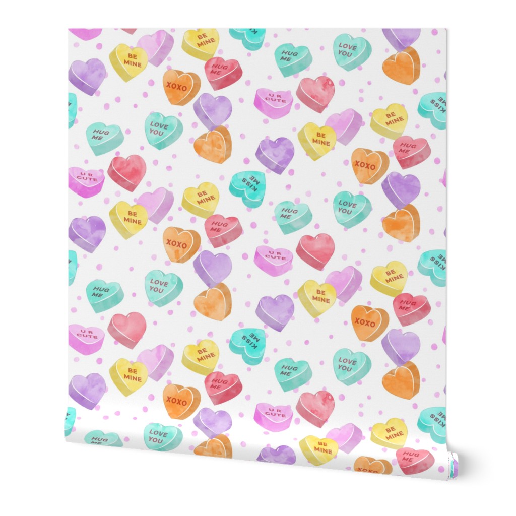 (micro scale) valentines day heart candy - conversation hearts  on  pink spots