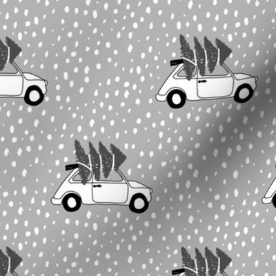 Driving home for Christmas Vintage Fiat 500 christmas tree winter snow wonderland black and white